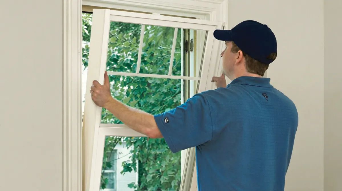 Professional contractors performing a residential window insulation and replacement service in Albuquerque, NM